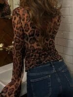 OnlyTrend x Revolte Animal Print Tie-Up Neck Top