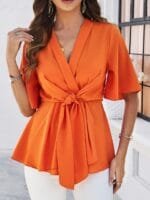 StyleCast x Revolte Orange V-Neck Flared Sleeves Tie-Ups Detail Wrap Longline Top