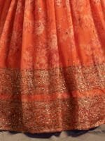 OnlyTrend Orange & Gold-Toned Embroidered Sequinned Shibori Semi-Stitched Lehenga & Unstitched Blouse With